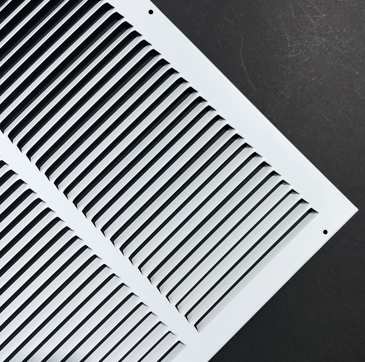 Fits 14x20 Duct Opening Stamped Steel Return Air Grille Vent Cover Grille for Sidewall and Ceiling in White Surface Dimensions: 15.75"W X 21.75"H (14" W x 20" H Duct Opening)