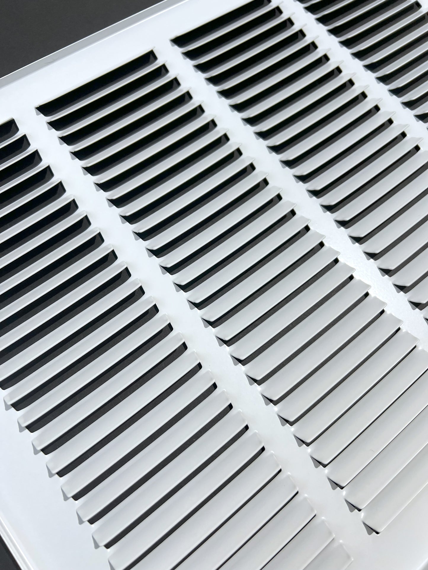 Fits 16x16 Duct Opening Stamped Steel Return Air Grille Vent Cover Grille for Sidewall and Ceiling in White Surface Dimensions: 17.75"W X 17.75"H (16" W x 16" H Duct Opening)