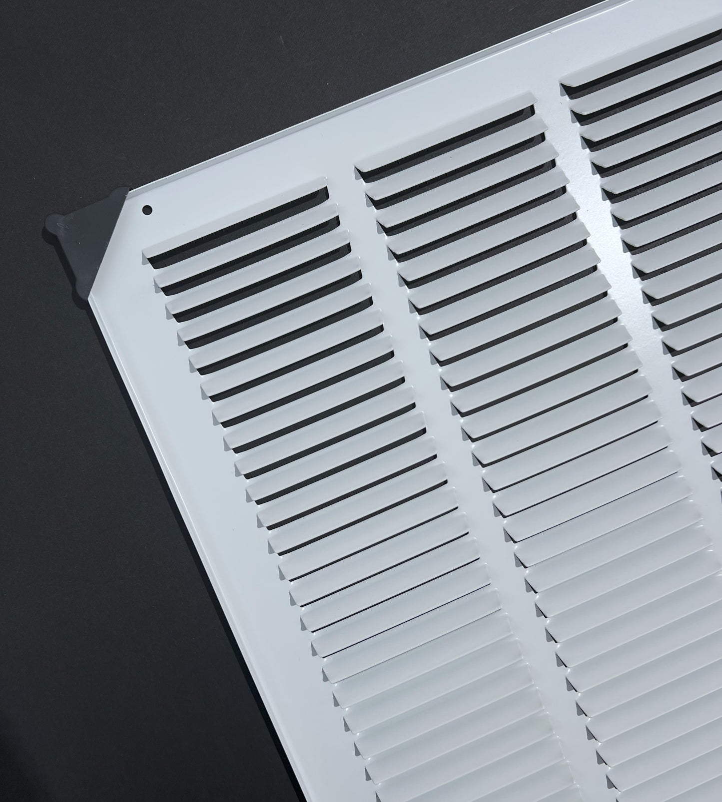 Fits 16x16 Duct Opening Stamped Steel Return Air Grille Vent Cover Grille for Sidewall and Ceiling in White Surface Dimensions: 17.75"W X 17.75"H (16" W x 16" H Duct Opening)