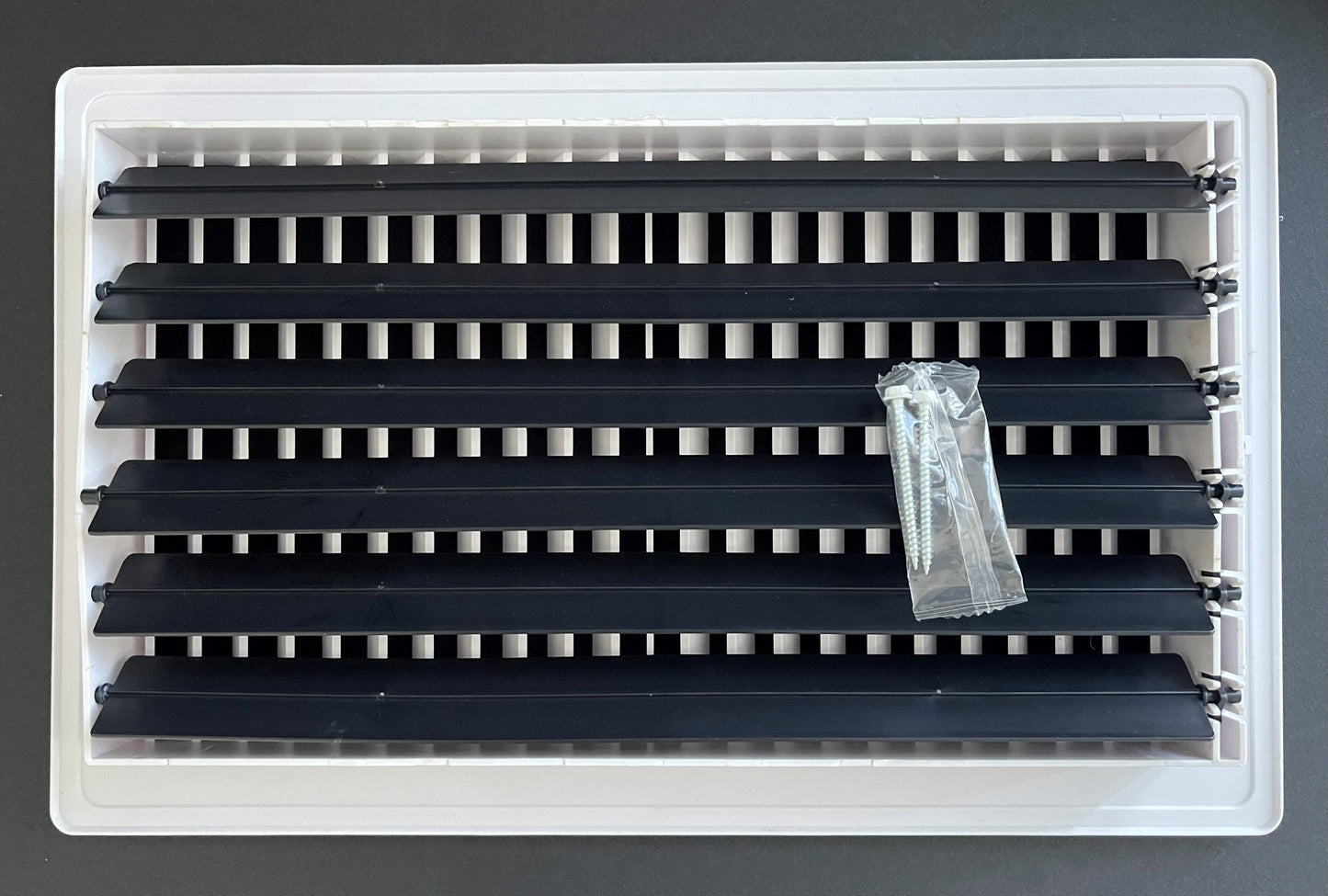 Two-Way Plastic Side Wall/Ceiling Register in White 14" w X 8" h for Duct Opening (Outside Dimension is 16" w X 10" h)