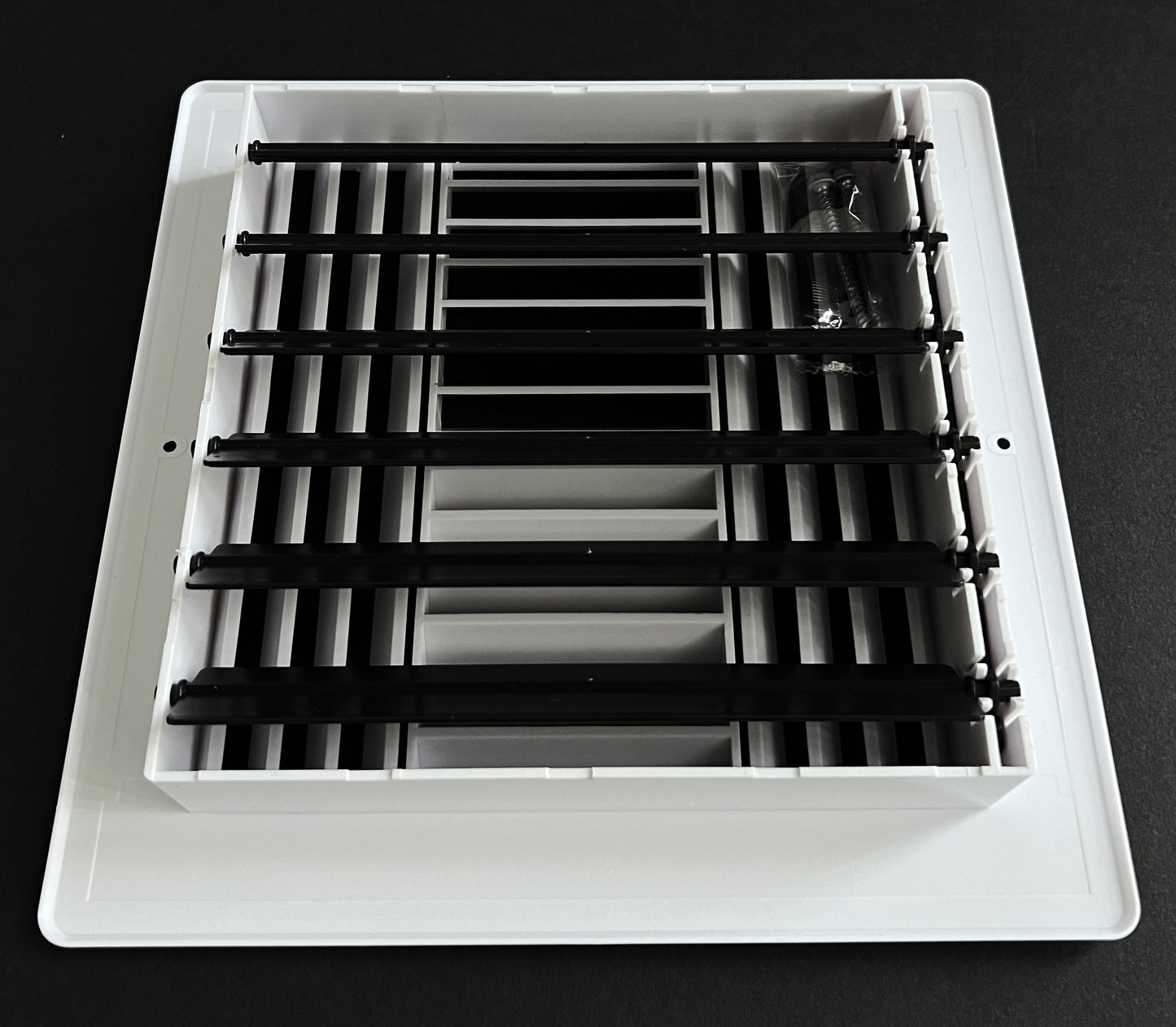 Four-Way Plastic Side Wall/Ceiling Register in White 6" w X 6" h for Duct Opening (Outside Dimension is 8" w X 8" h)