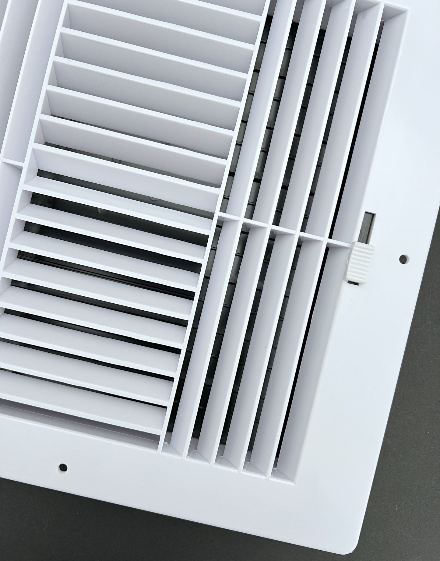 Four-Way Plastic Side Wall/Ceiling Register in White 10" w X 10" h for Duct Opening