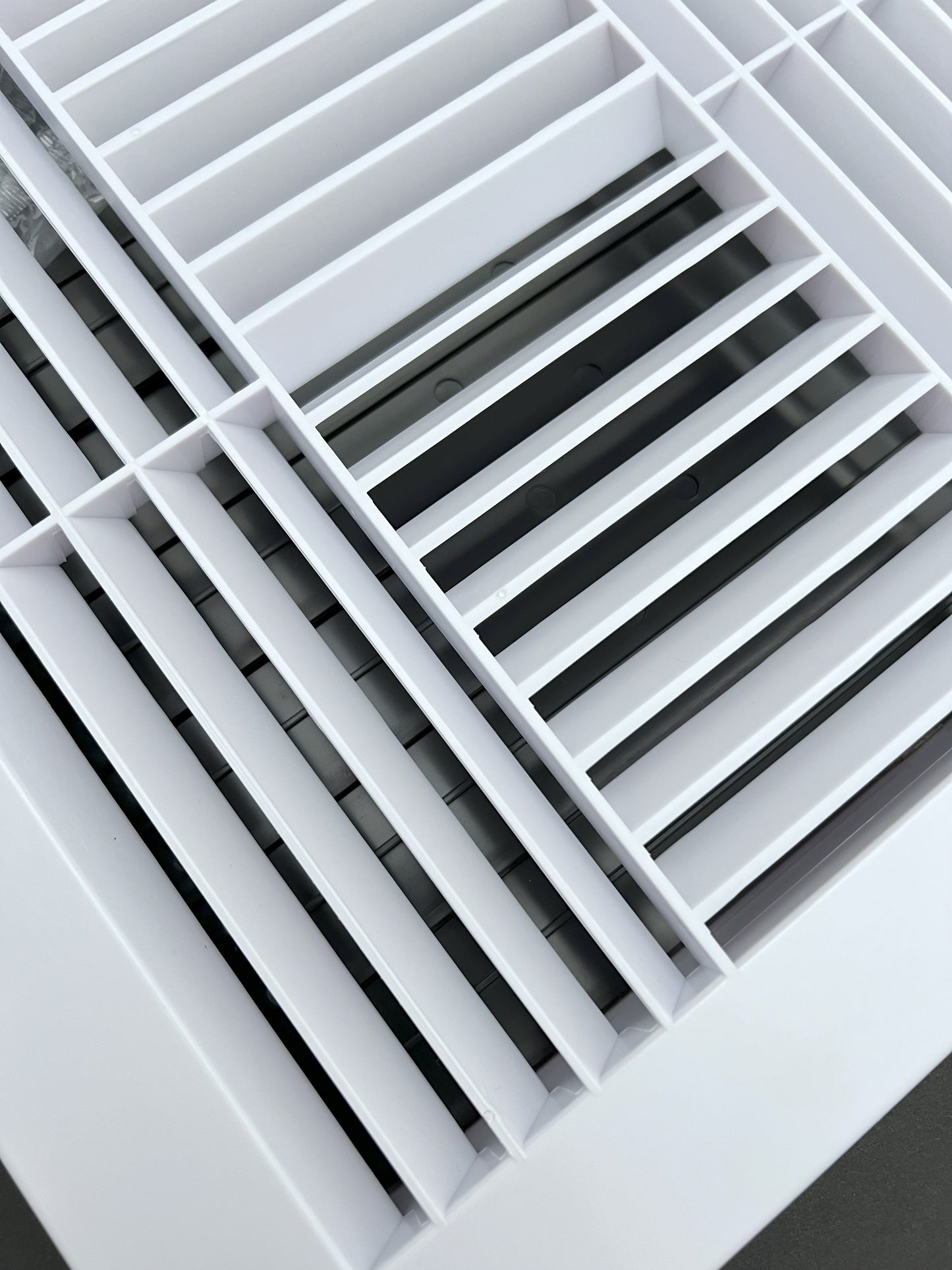 Four-Way Plastic Side Wall/Ceiling Register in White 10" w X 10" h for Duct Opening