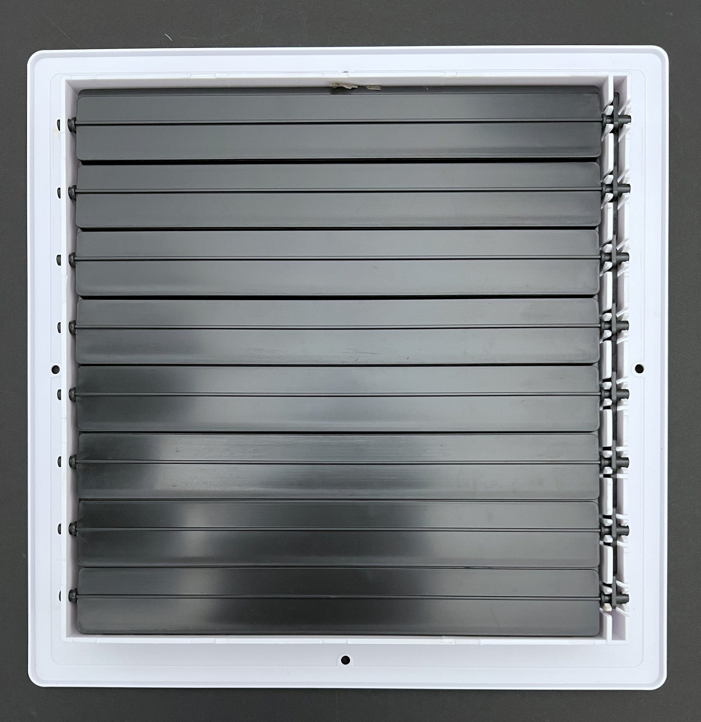 Four-Way Plastic Side Wall/Ceiling Register in White 10" w X 10" h for Duct Opening