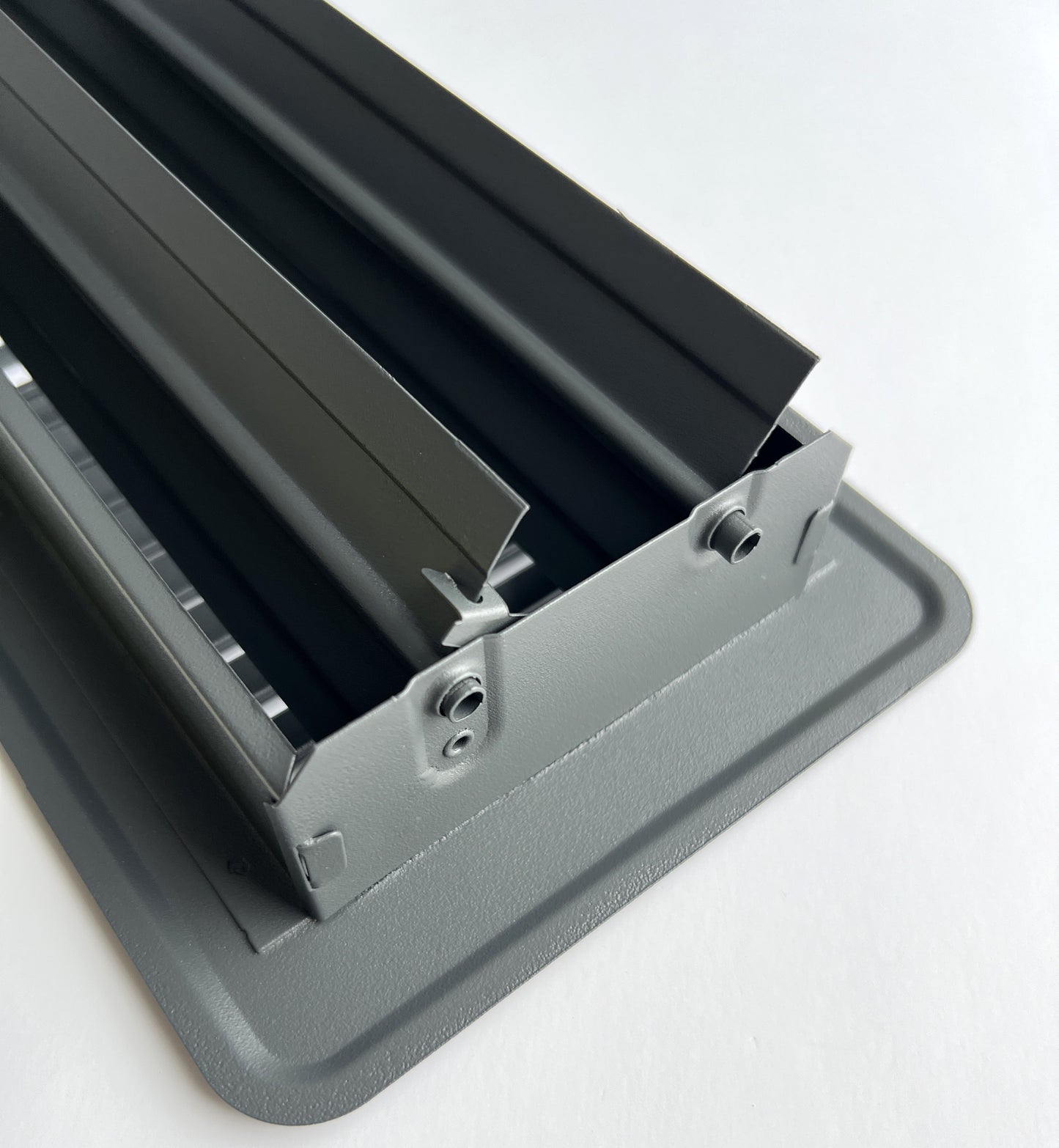 Heavy Duty Steel Decorative Slotted face Floor Vent with Beautiful Black Matte Finish. Fits in 4 x 10 Duct Opening. Overall Dimension is 5.75 in Wide x 13.75 in Long